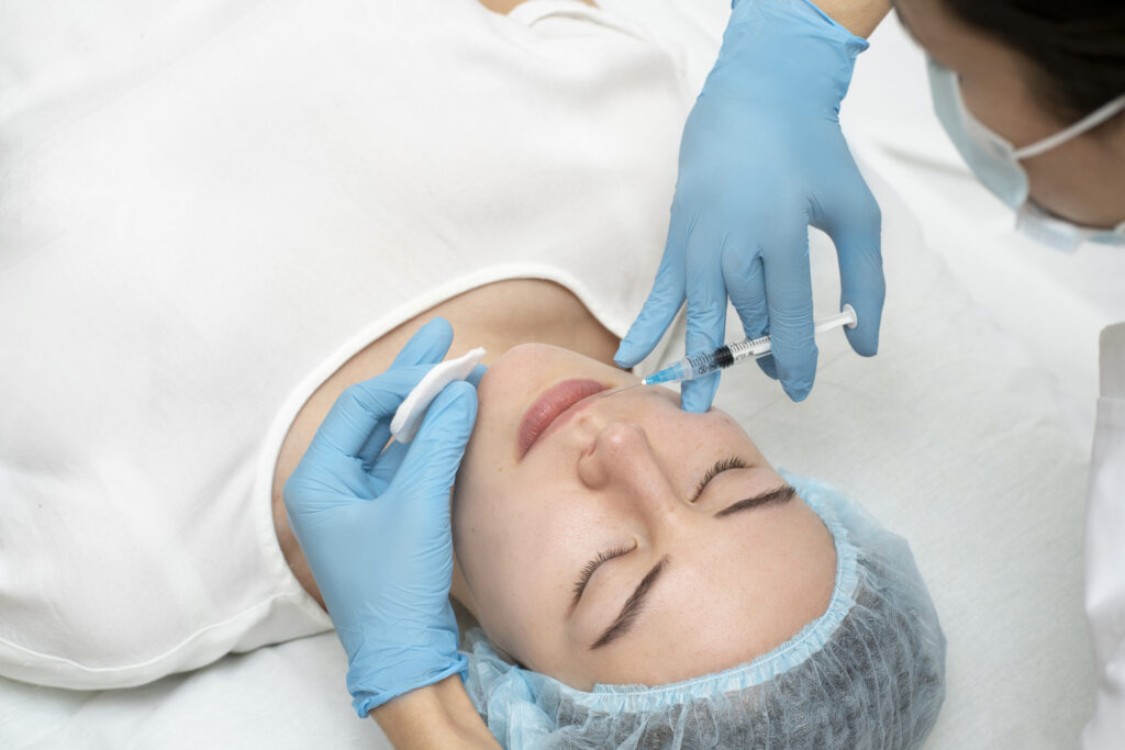 Dermatologist performing Injectable PDRN Therapy for skin rejuvenation and collagen stimulation