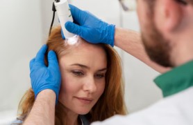 Final scalp enhancement results showing improved hair density and a natural-looking scalp appearance.